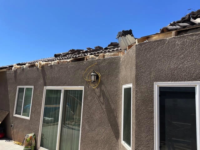 Residential roof tear-off before re-roofing